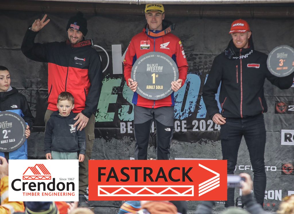 Conrad Mewse on the podium, flanked by Ashley Greedy and Dan Thornhill