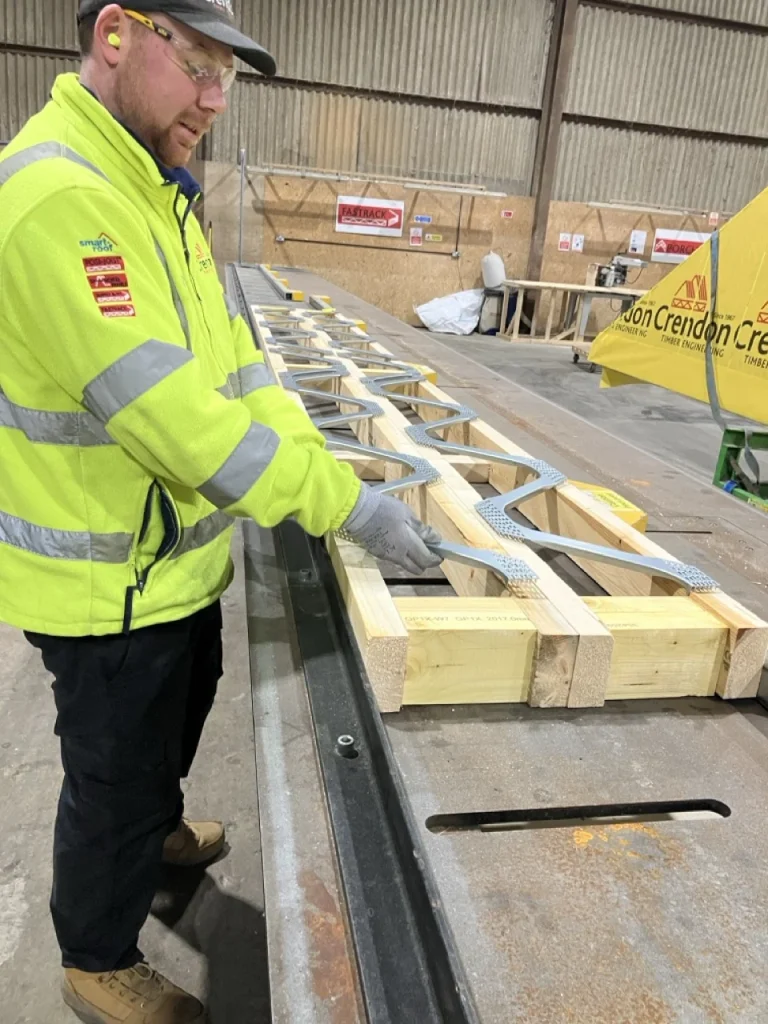 Man assembling a posi joist