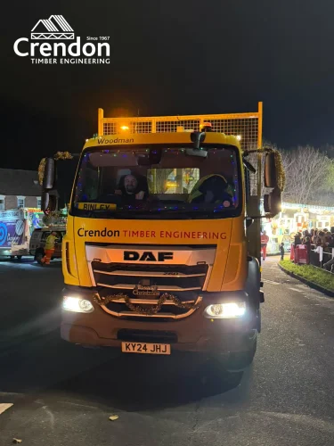 Yellow Crendon lorry with Christmas lights