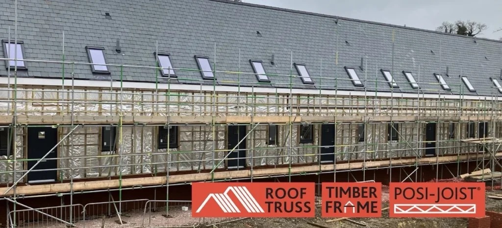 Building under construction surrounded by scaffolding