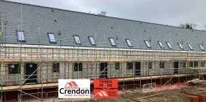 Building under construction covered in scaffolding