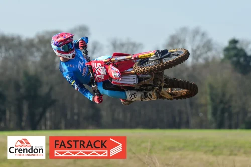 Mewse up in the air on his bike.