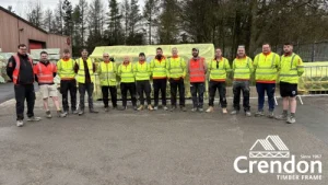Team photo with men wearing hi vis jackets