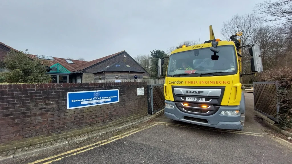 Crendon lorry leaving entrance of a primary school