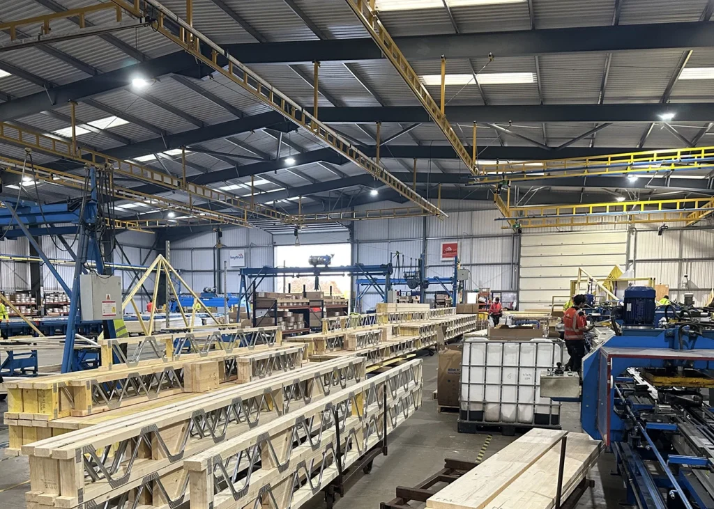 Warehouse with materials, machinery, products and workers