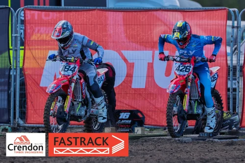 Two bike racers on their bikes. 