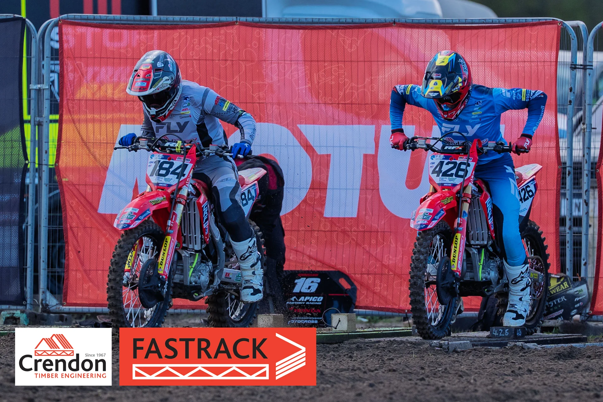 Two bike racers on their bikes.