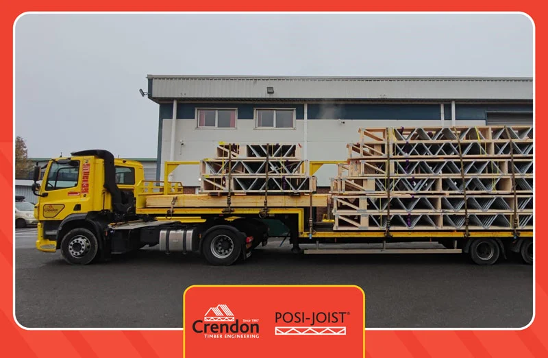 Lorry loaded with Posi-Joists in front of a warehouse