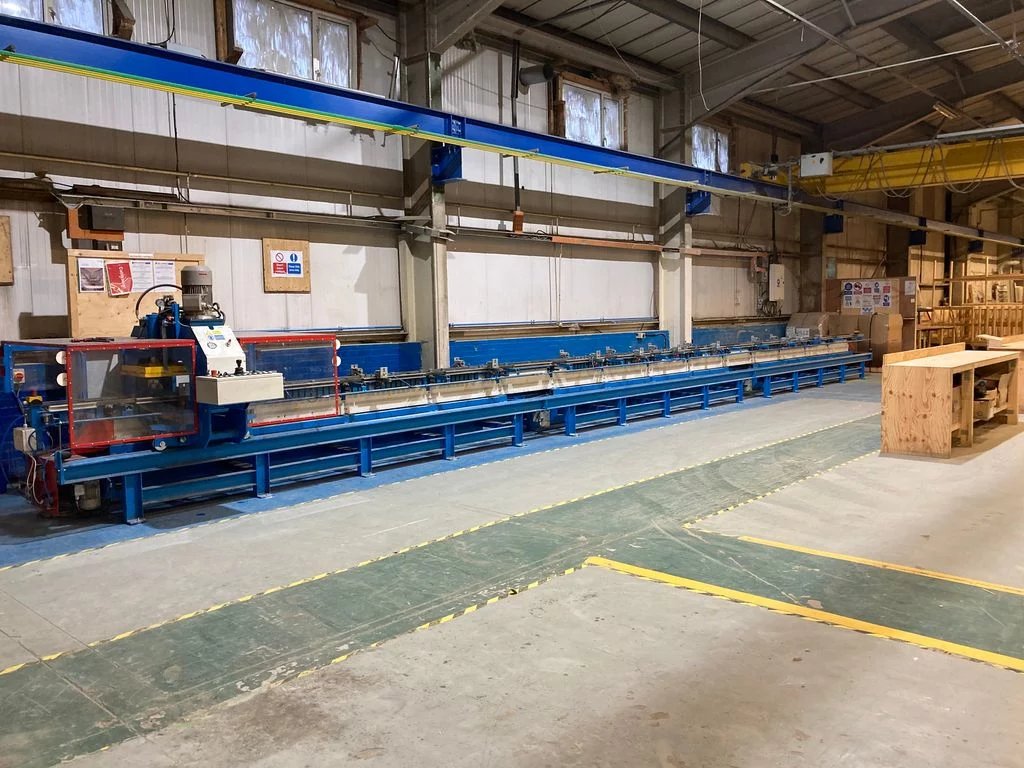 Assembly line machinery inside a warehouse