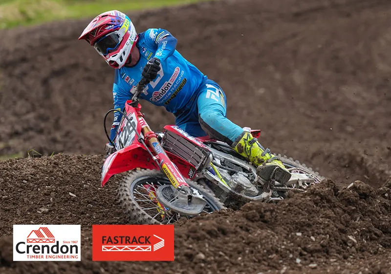 Man on dirt bike taking a corner