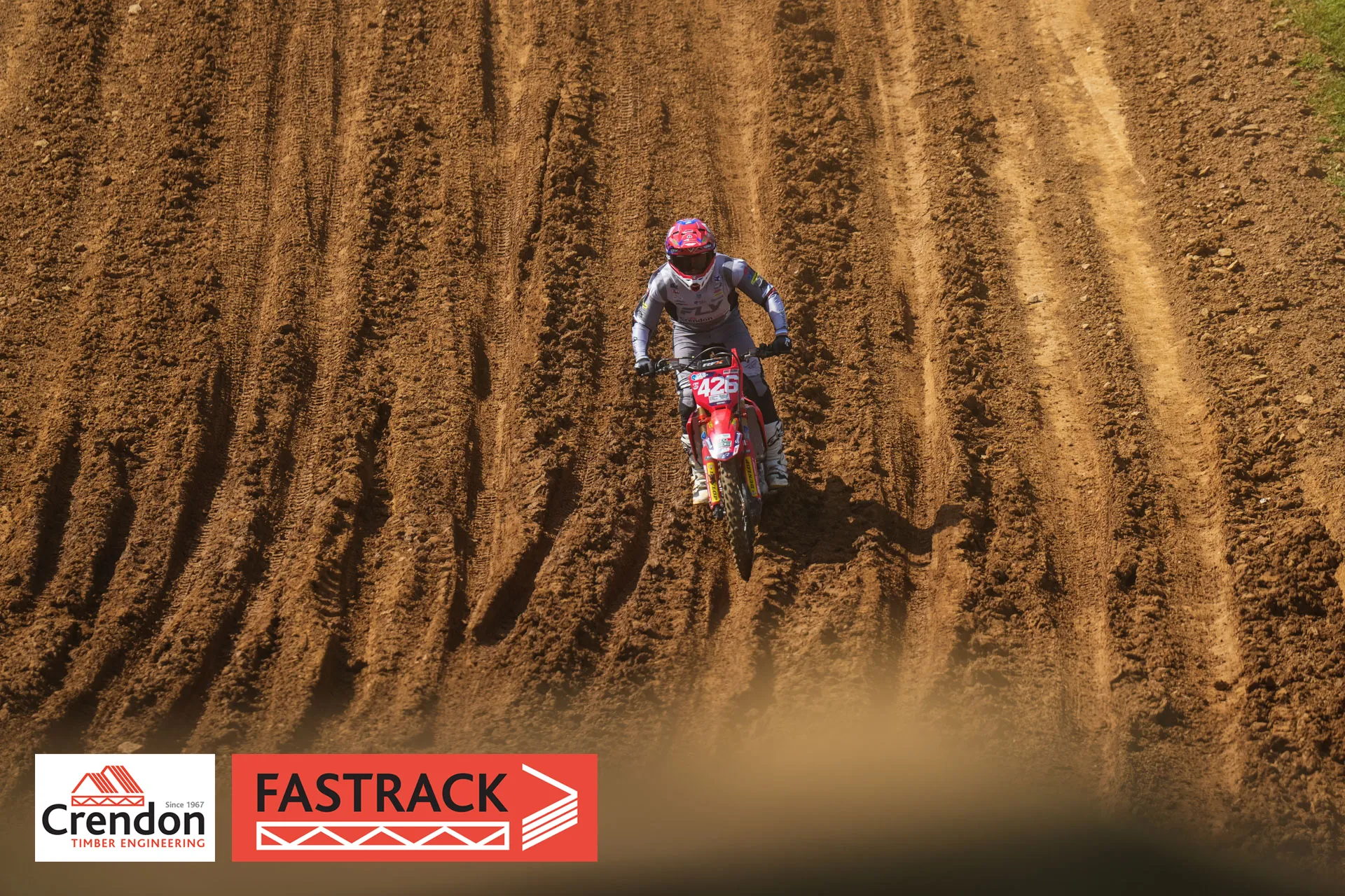 Motocross biker on a dirt track