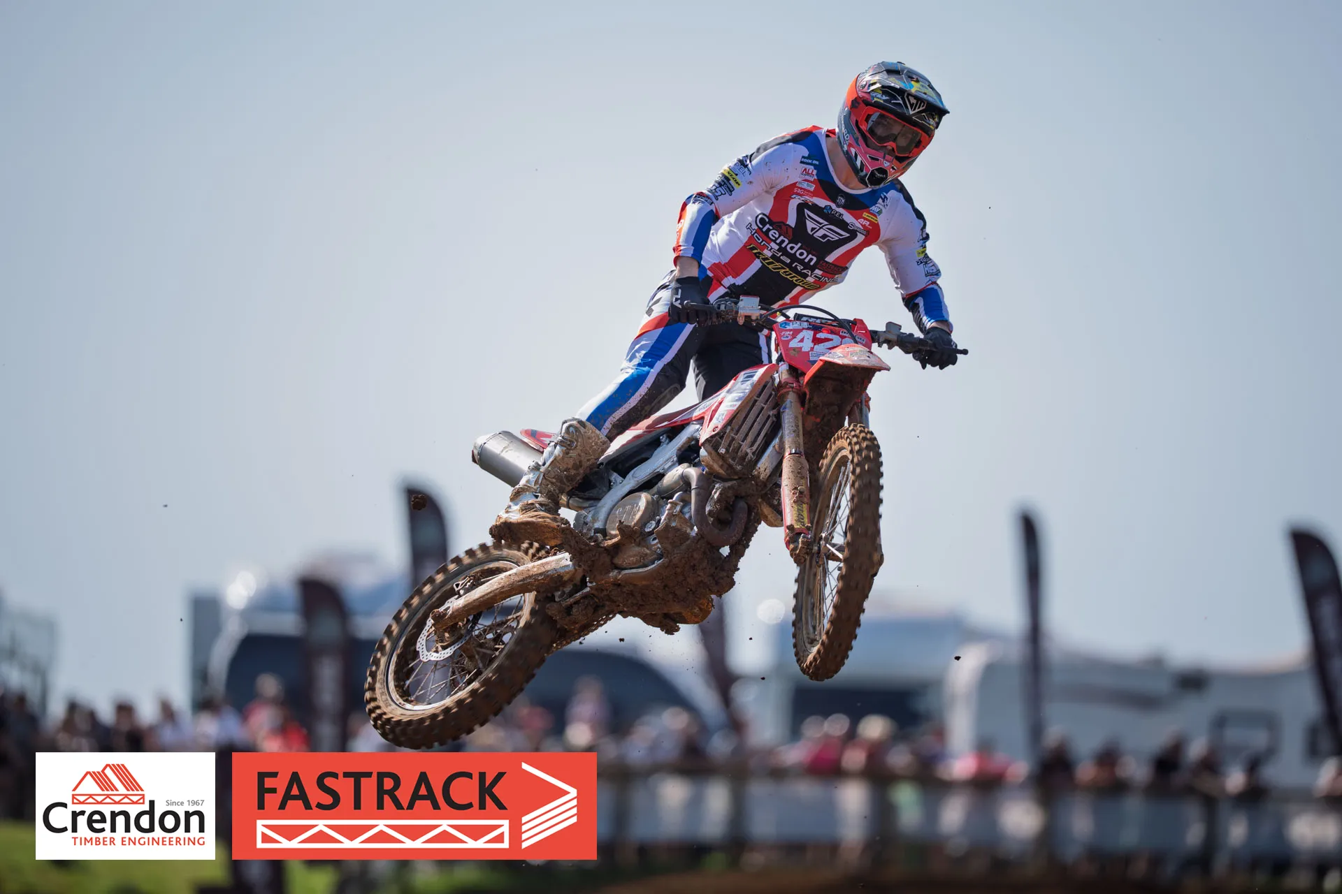 Motocross biker jumping in the air