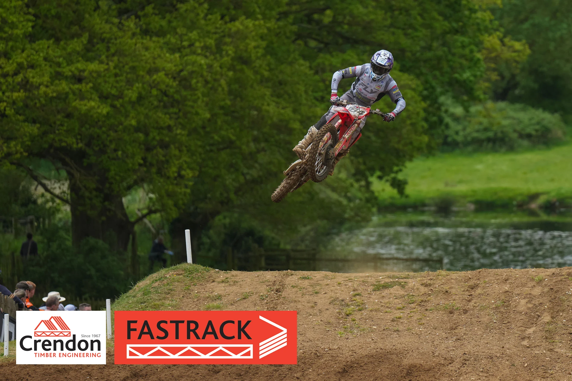 A rider jumping up in the air.