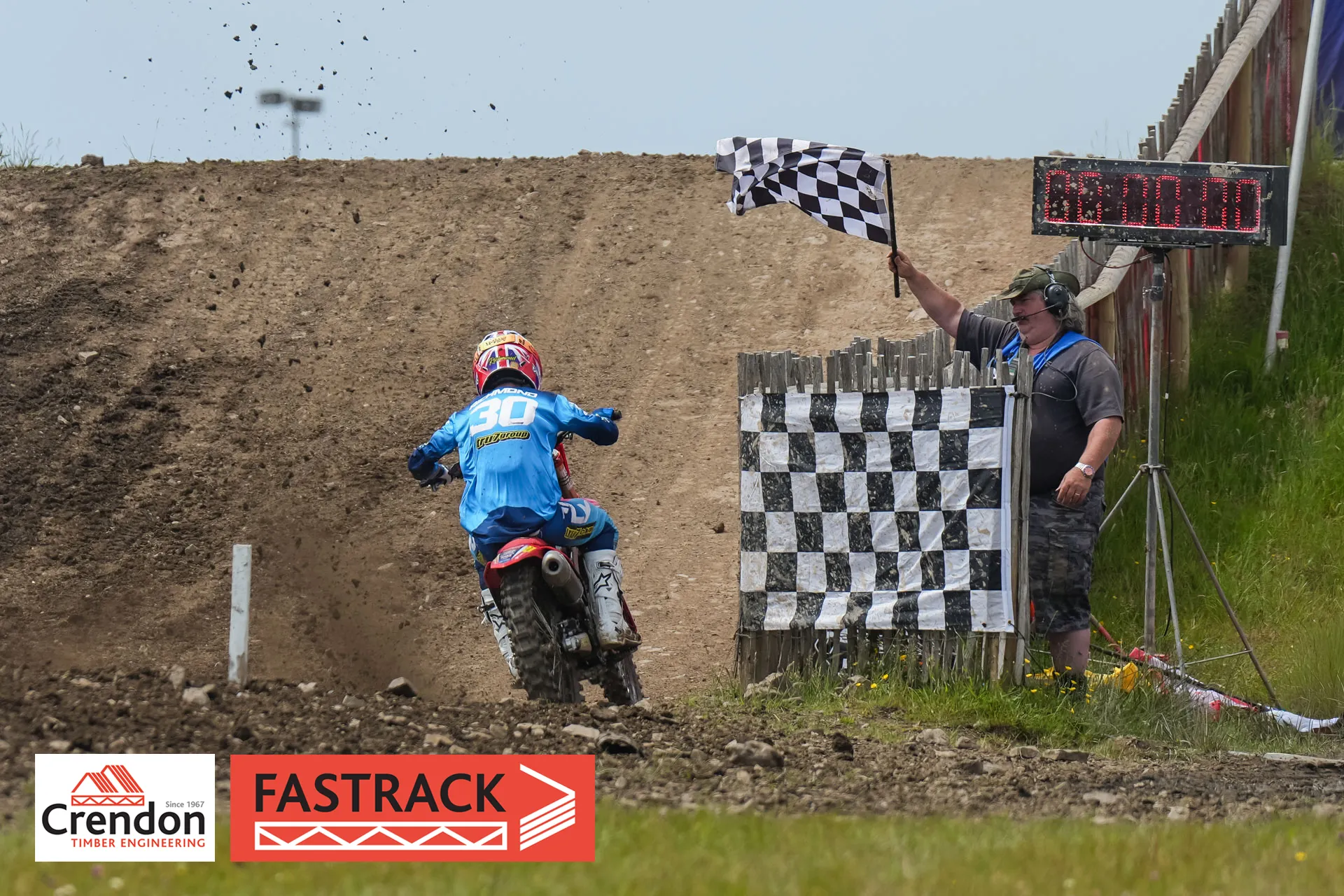 Motocross biker on a dirt track