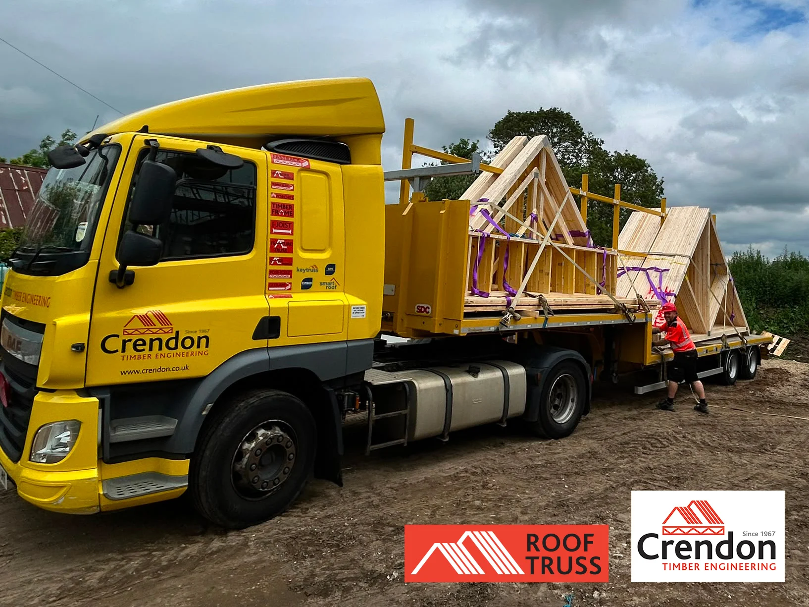 yellow lorry with roof truss