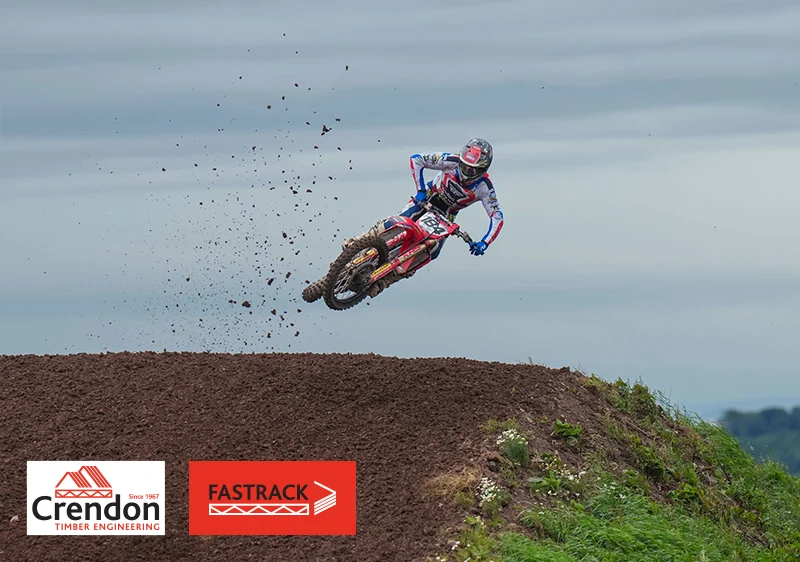 Rider on Red Dirt Bike in the air