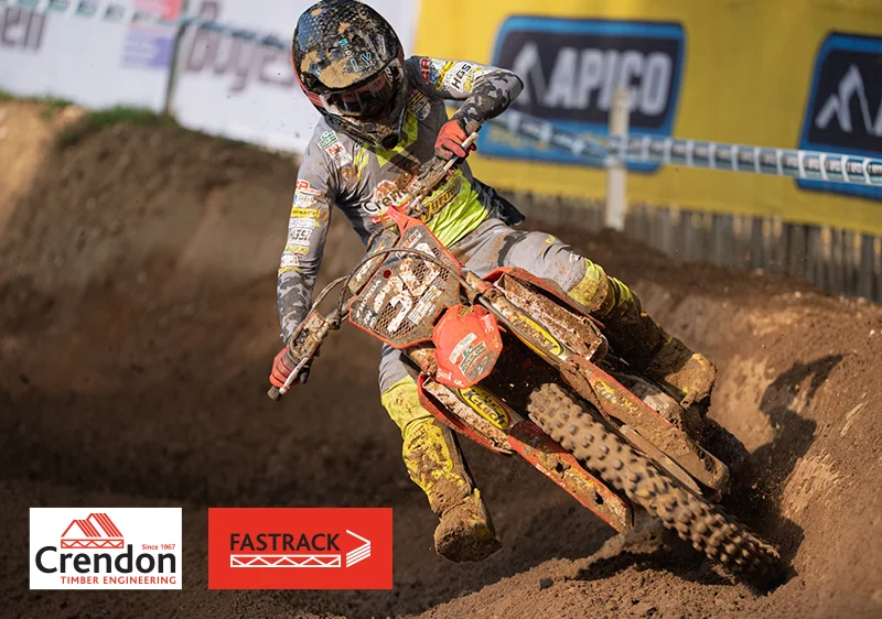 Rider in a berm with right foot out