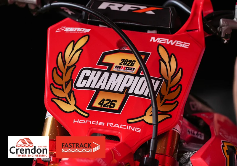 Dirt bike with champion logo plate