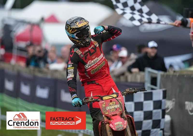 Rider at the end of race with finishing flags visible