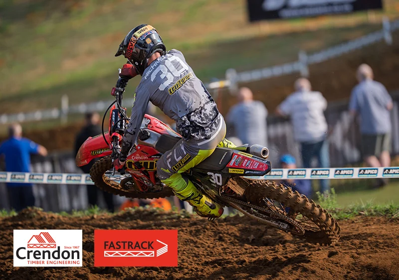 Rider cornering with front wheel in the air
